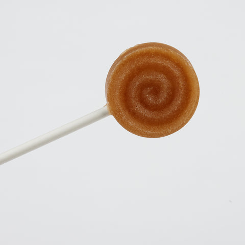Xylit Lolli Cola Geschmack, runder flacher Lutscher mit erhabener Spiralform, Produktbild