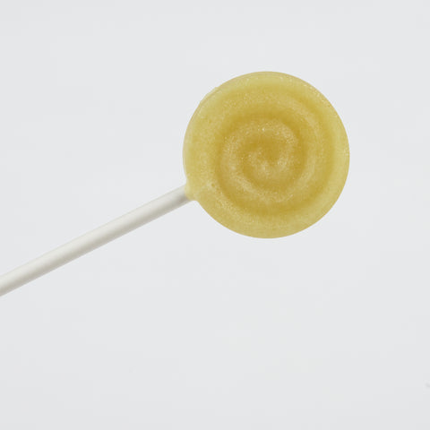 Xylit Lolli Stachelbeere Geschmack, runder flacher Lutscher mit erhabener Spiralform, Produktbild