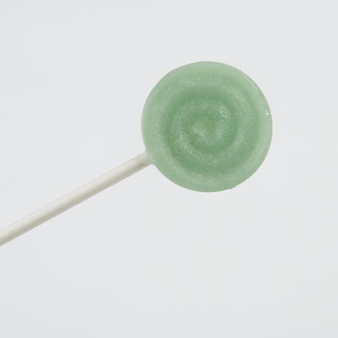 Xylit Lolli Waldmeister Geschmack, runder flacher Lutscher mit erhabener Spiralform, Produktbild